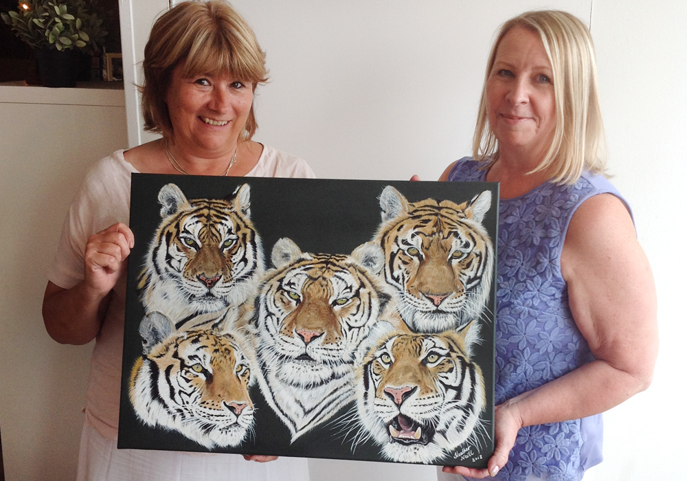 LOCAL ARTIST PAINTS RESCUED TIGERS IN AID OF WILDHEART TRUST