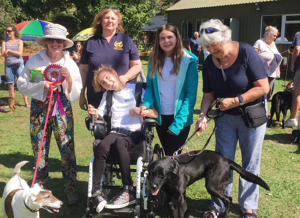 SUCCESSFUL DOG SHOW SEES PLENTY OF TAILS WAGGING