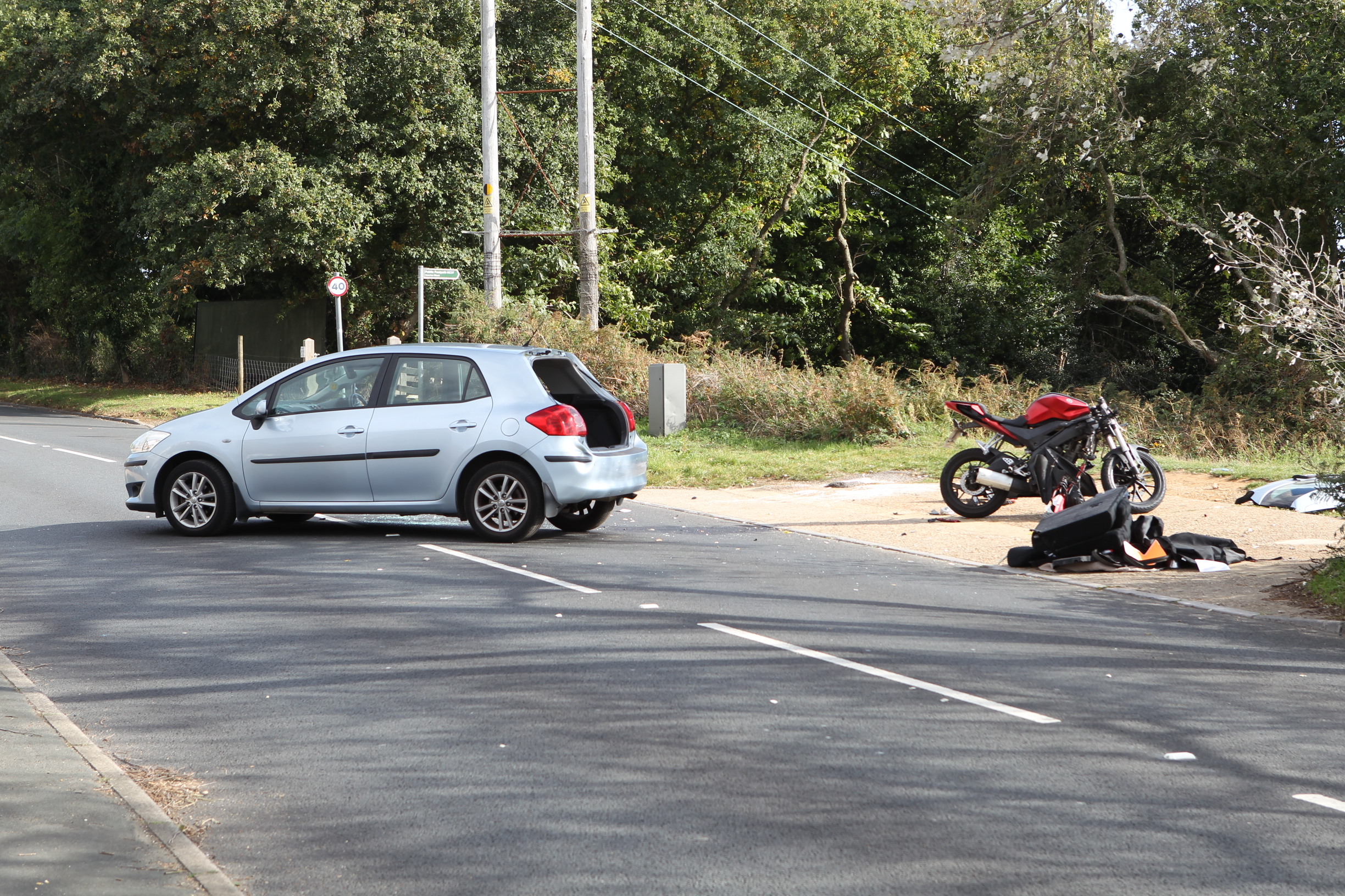 CAR AND MOTORCYCLE IN CRASH AT APSE HEATH