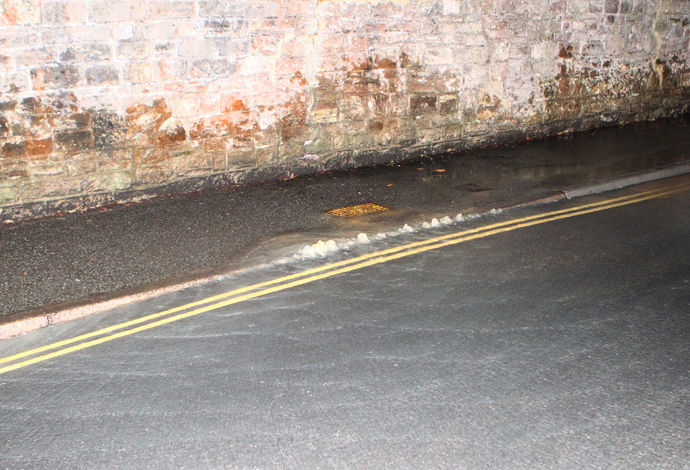 BURST WATER MAIN LIFTS ROAD IN RYDE