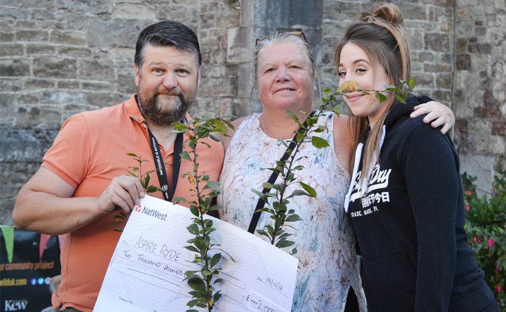 £2,000 CHEQUE FOR ASPIRE RYDE THANKS TO TK MAXX COMMUNITY FUND