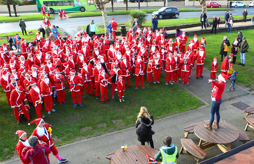 SANTAS DASH THROUGH RYDE IN AID OF MOUNTBATTEN