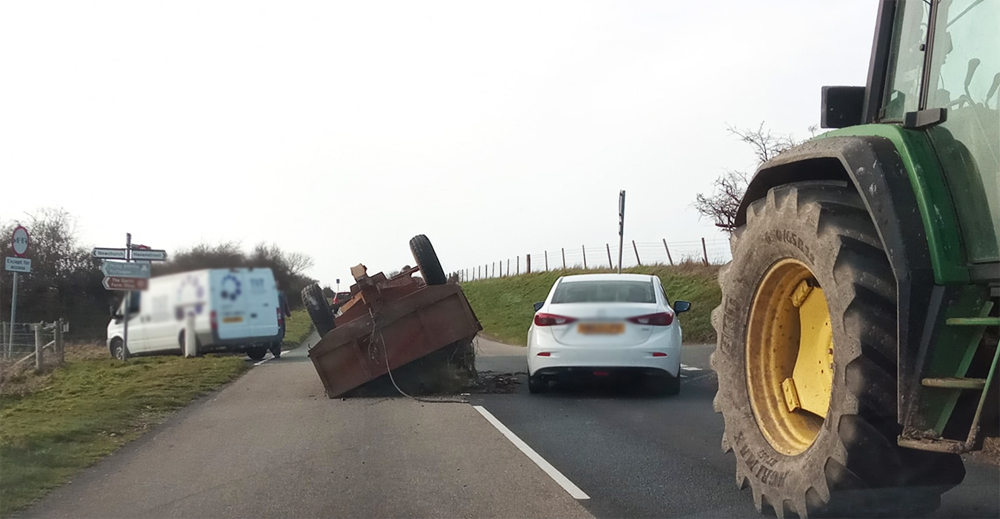 TRACTOR TRAILER TOPPLES OVER ON BRADING DOWNS