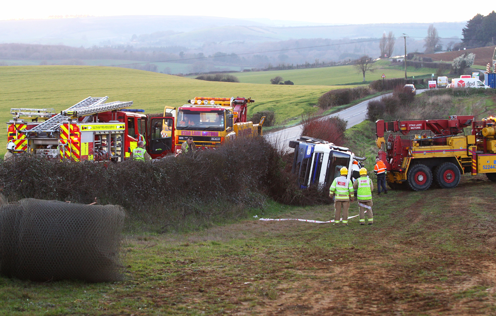 SEWAGE TANKER ROLLS ONTO SIDE NEAR ARRETON