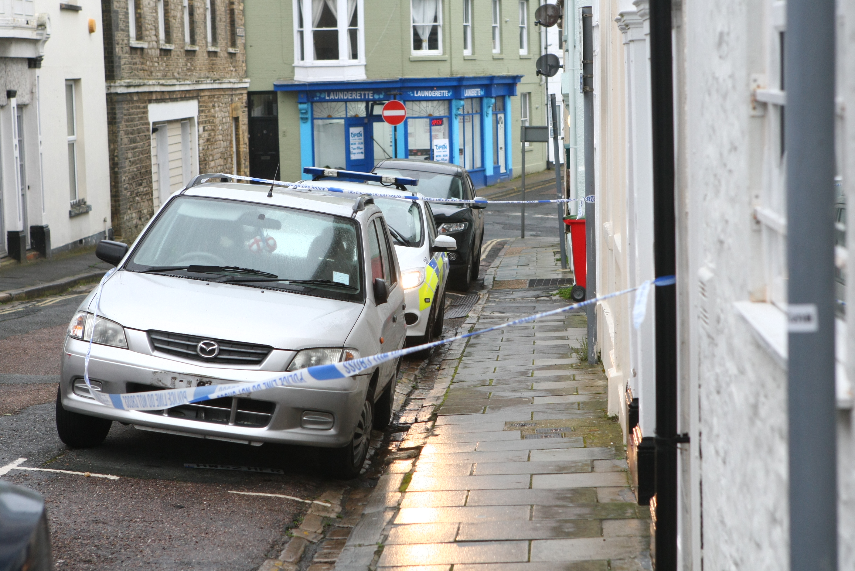 POLICE ERECT CORDON AFTER PERSON FOUND LYING IN THE STREET