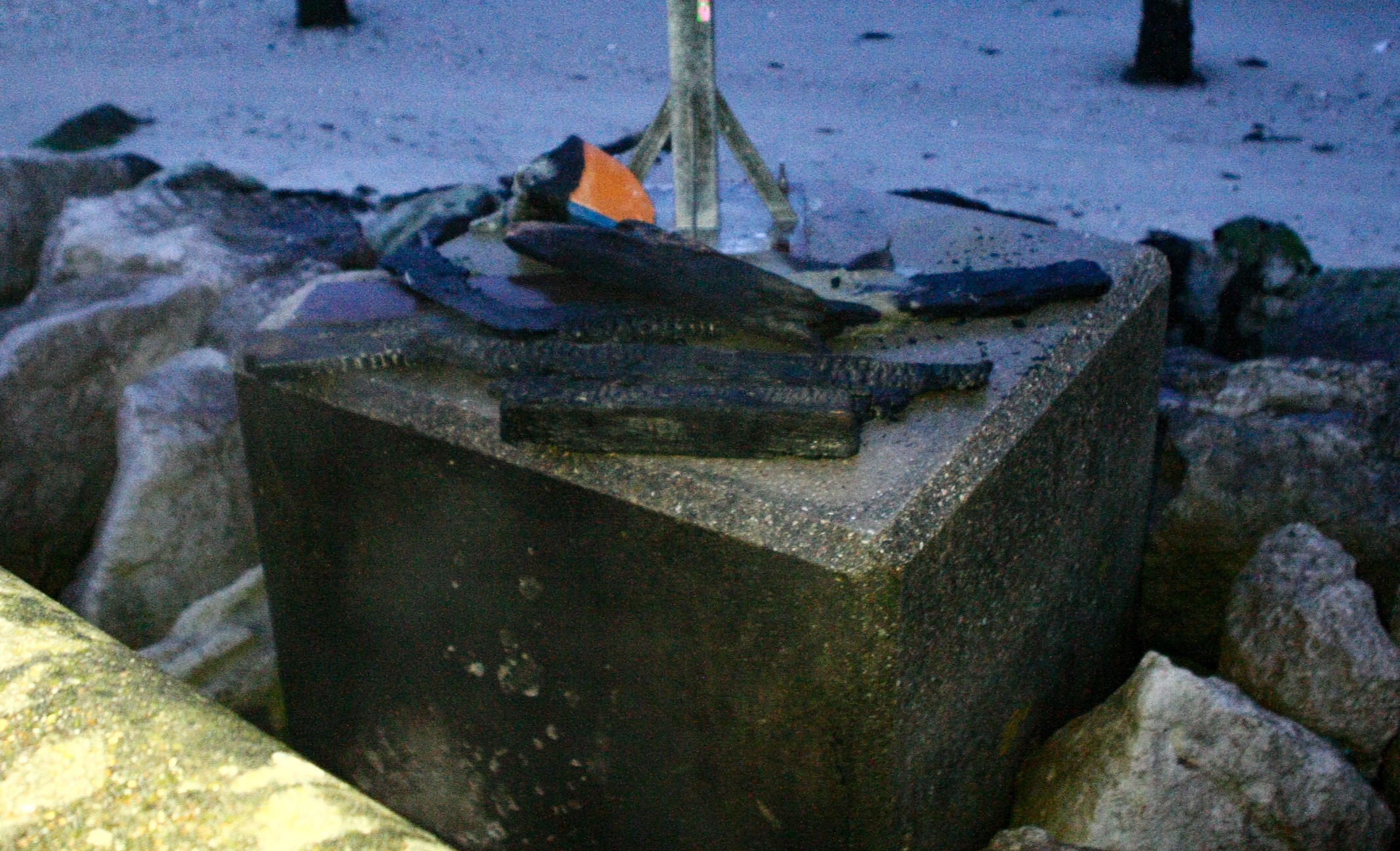 FIRE IN AMONGST THE ROCKS AT RYDE HARBOUR