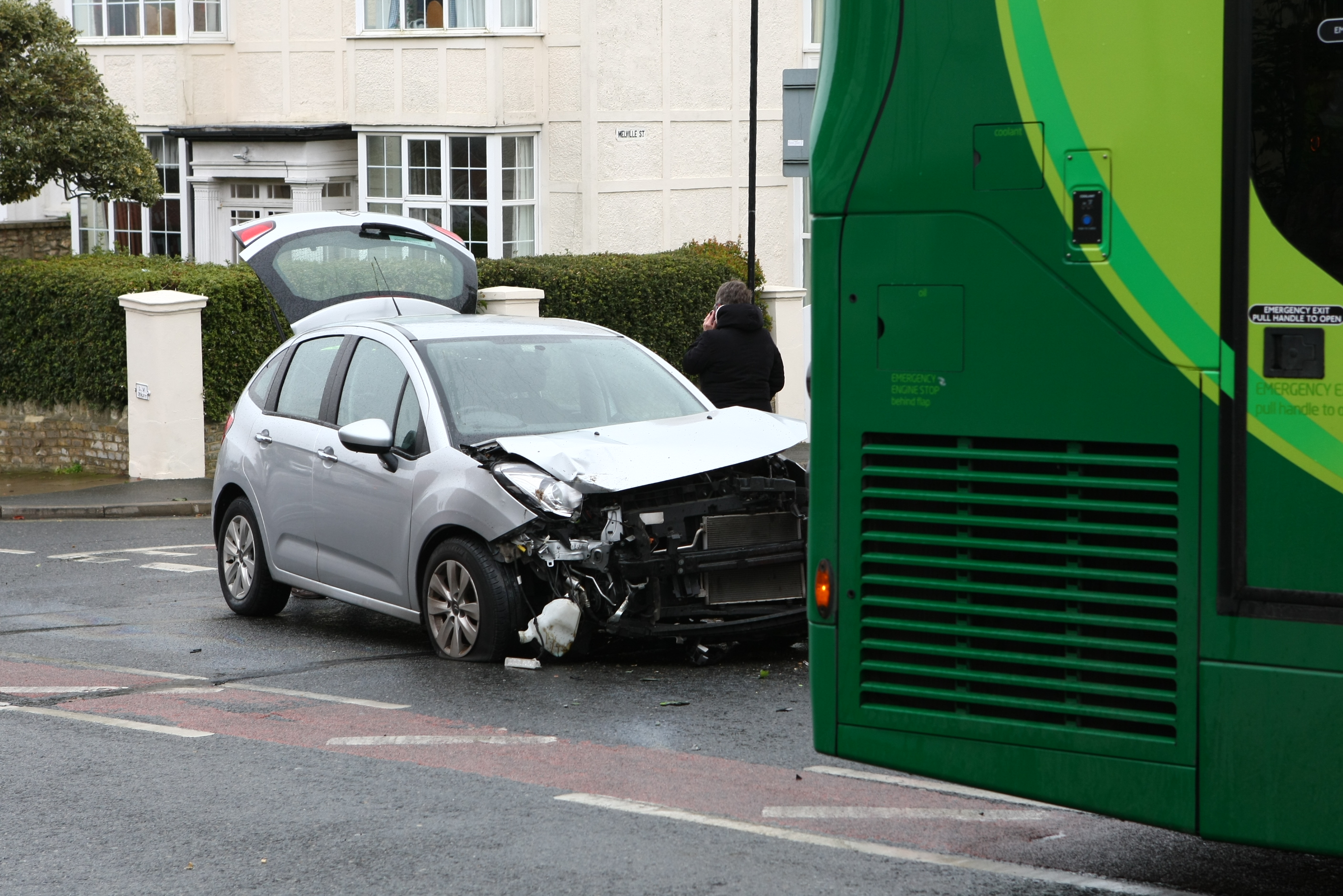 BUS AND CAR COLLIDE IN RYDE