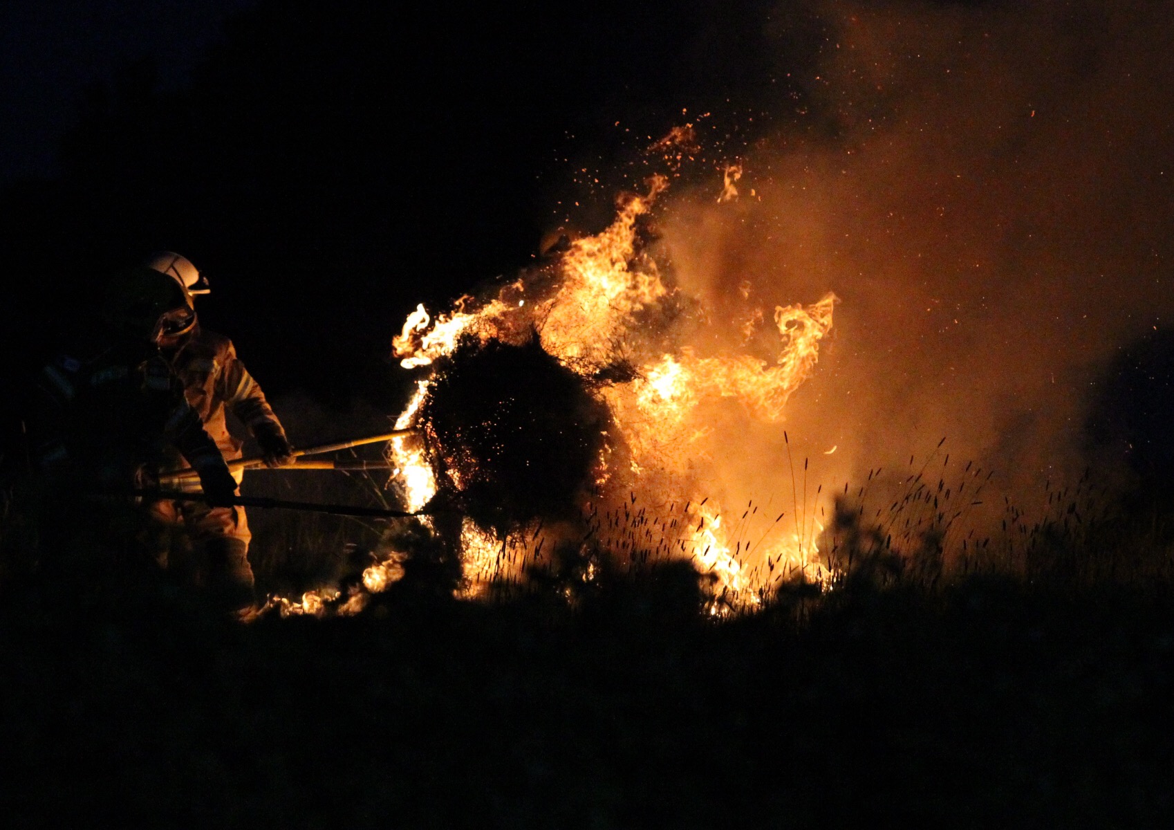 HAYBALES WELL ALIGHT IN FIELD IN EAST COWES