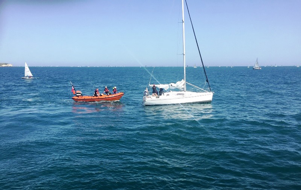 LIFEBOATS IN ACTION DURING SLOW BUT BUSY ROUND THE ISLAND RACE