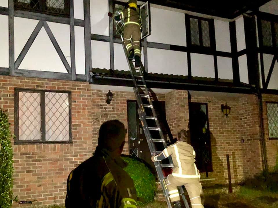 FIREFIGHTERS USE LADDER TO GAIN ENTRY TO WEST WIGHT PROPERTY