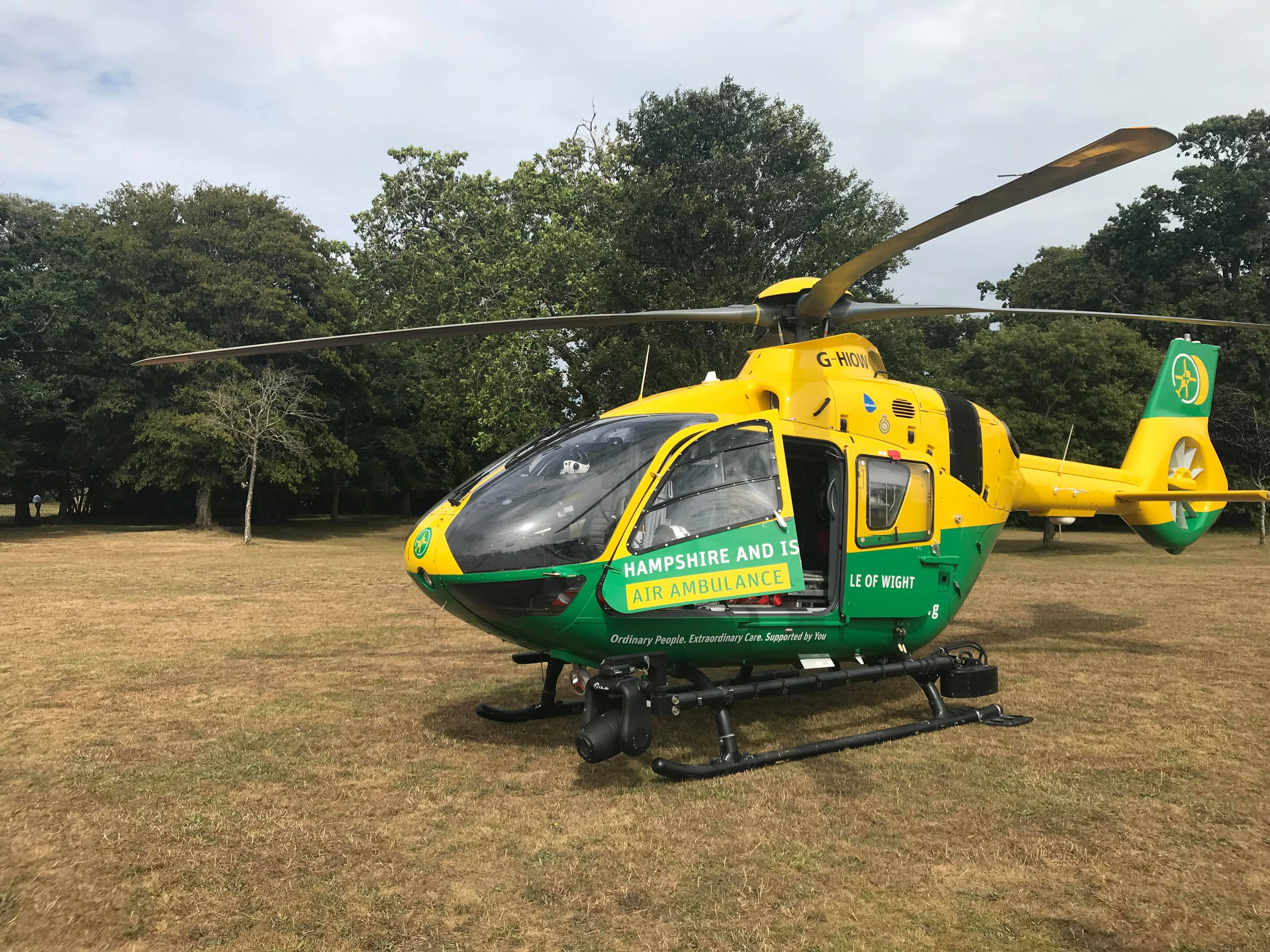 MEDICAL EMERGENCY SEES AIR AMBULANCE LAND IN COWES
