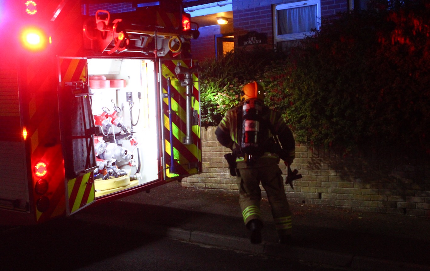SMOKE ISSUING FROM FLAT PROMPTS FIRE RESPONSE