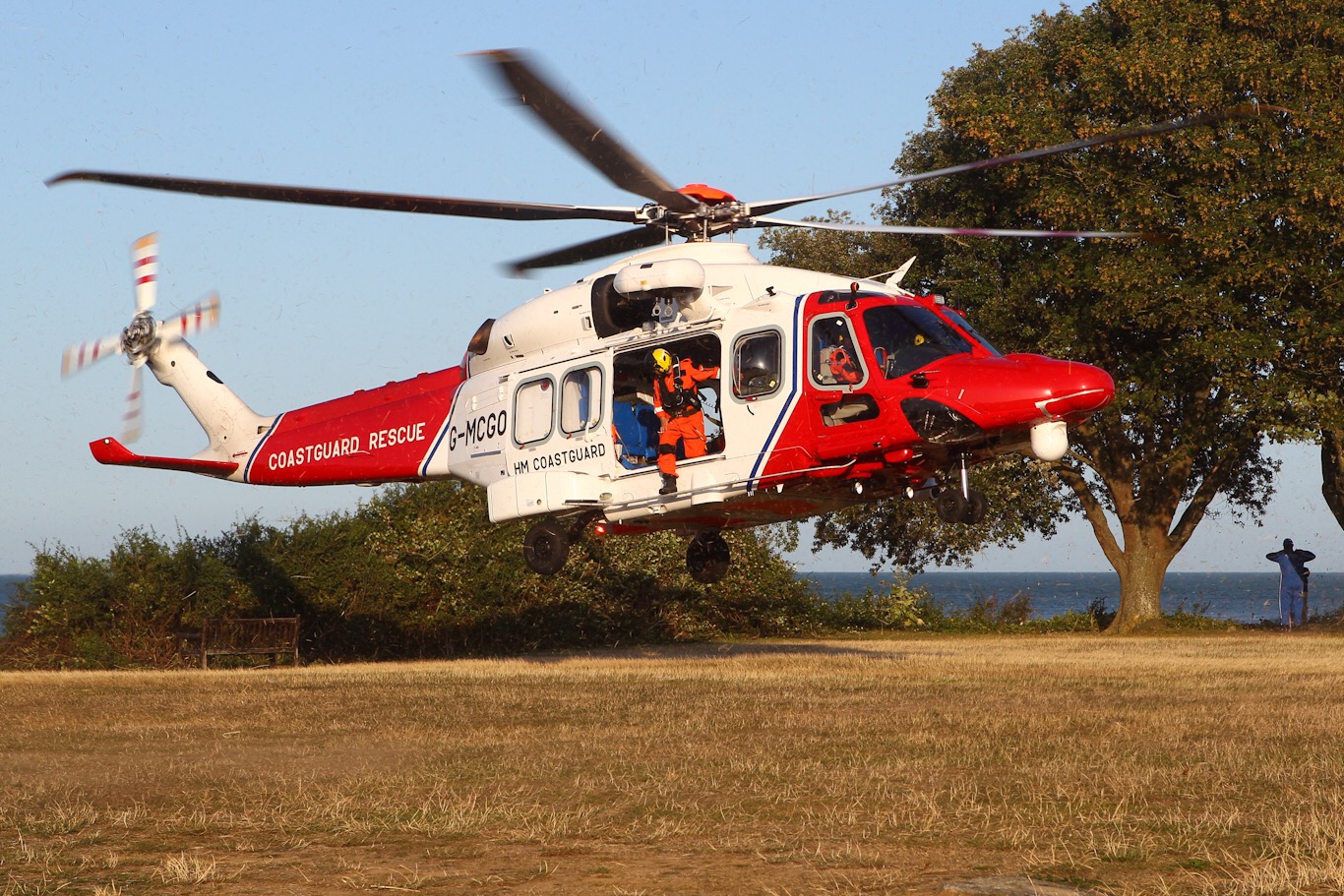 COASTGUARD HELICOPTER LANDS AT BEMBRIDGE TO AIRLIFT INJURED SAILOR