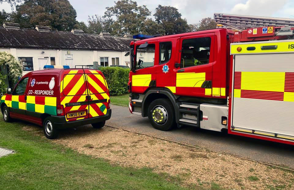FIREFIGHTERS ASSIST IN MOVING FEMALE PATIENT FOLLOWING MEDICAL INCIDENT