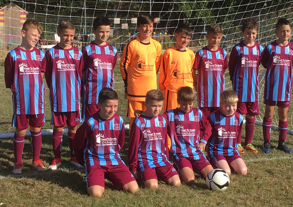 FOOTBALL TEAM SCORE BRAND NEW KIT THANKS TO ESTATE AGENTS