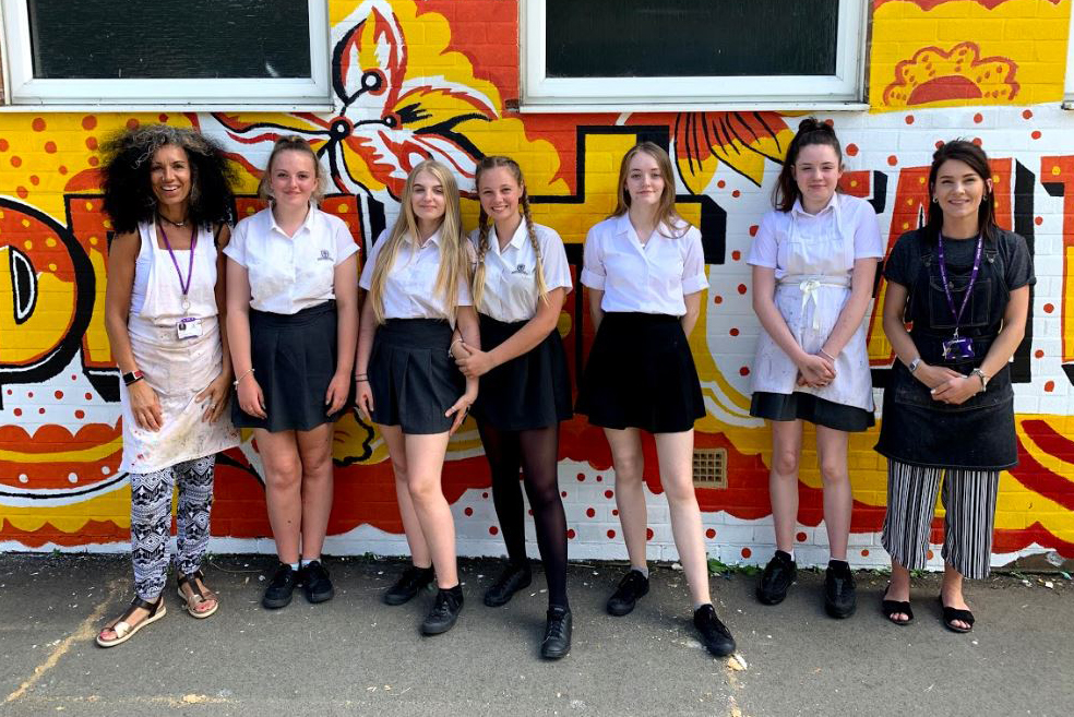 CHRIST THE KING STUDENTS DESIGN AND PAINT MURAL FOR NEARBY PRIMARY SCHOOL