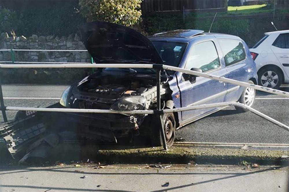 ARREST MADE AFTER CAR CRASHES INTO RAILINGS IN LAKE