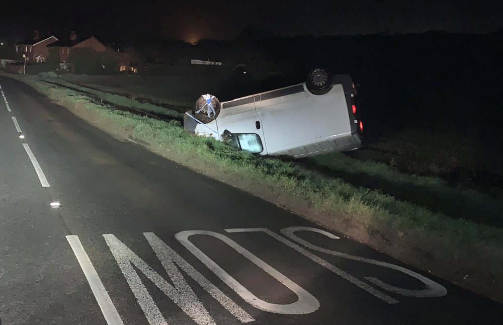 VAN CRASHES ONTO ROOF AT BLACKWATER AS HEAVY RAIN FLOODS ROADS