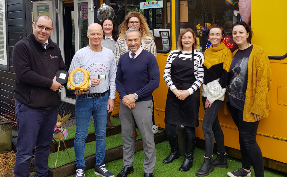 BUS STOP CAFE RECEIVES DEFIBRILLATOR THANKS TO LOCAL DONATIONS