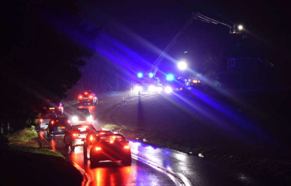 FIREFIGHTERS WORK TO EXTINGUISH CHIMNEY FIRE IN ROOKLEY