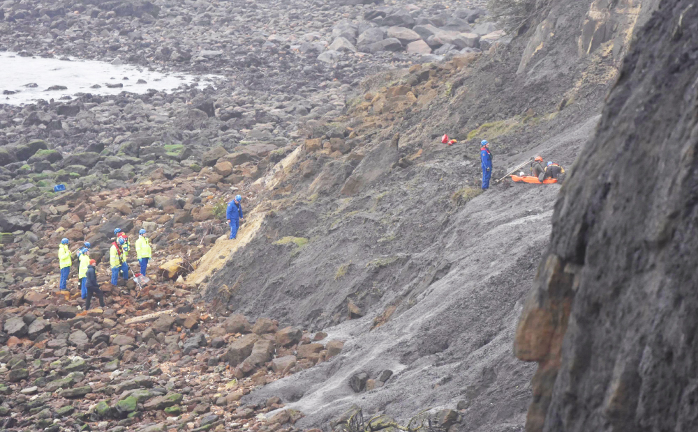 COASTGUARD WORK TO RESCUE PERSON STUCK IN THE MUD NEAR BONCHURCH