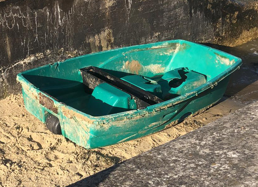 UPTURNED TENDER SPARKS CONCERN ON THE COAST AT RYDE