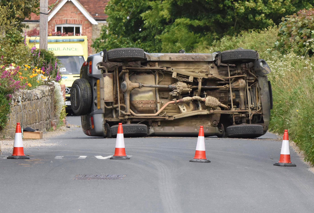 CAR ROLLS ONTO ITS SIDE NEAR NITON VILLAGE