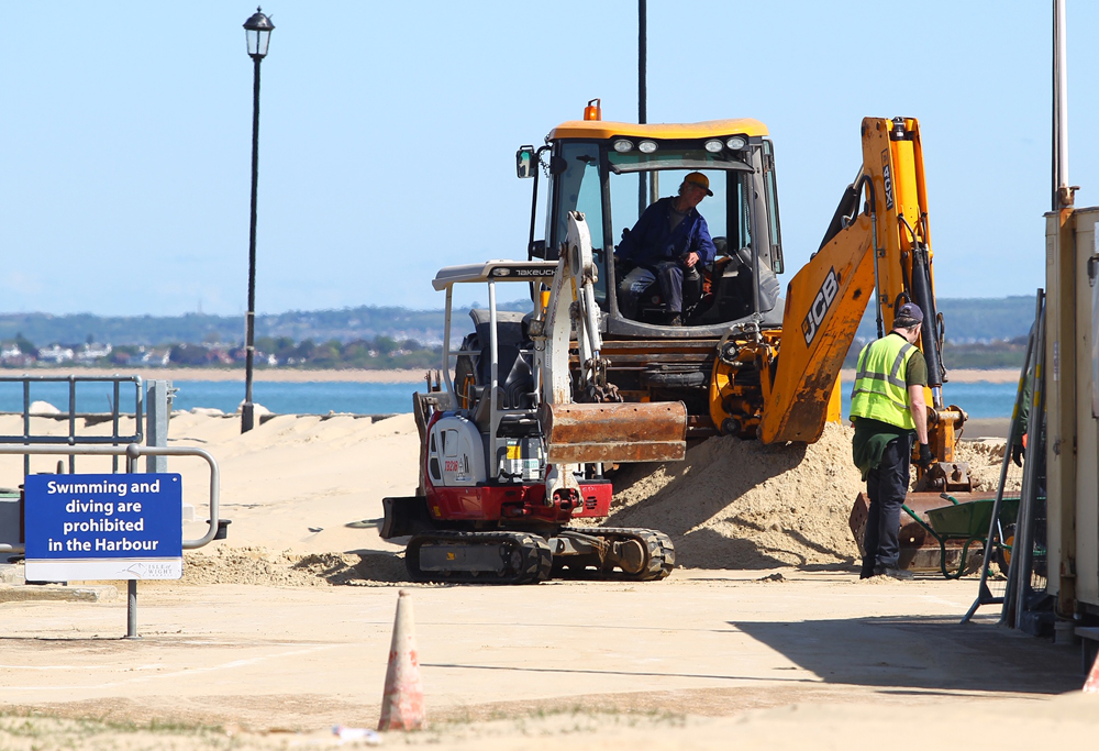 COUNCIL CARRY OUT BIG SAND CLEAR UP AT RYDE BEACH