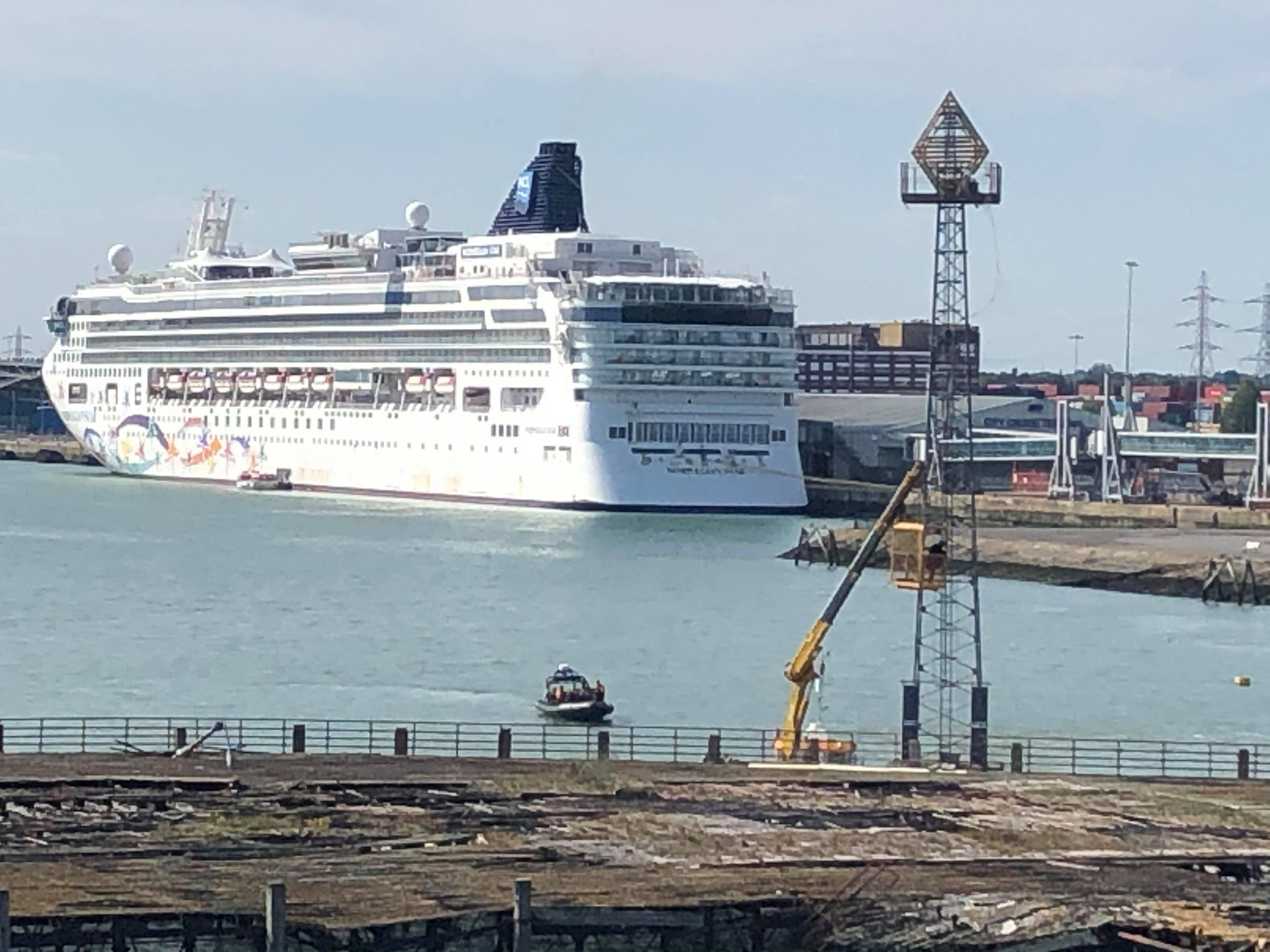 DRAMA AT FERRY TERMINAL AS MAN CLIMBS NAVIGATIONAL MARKER