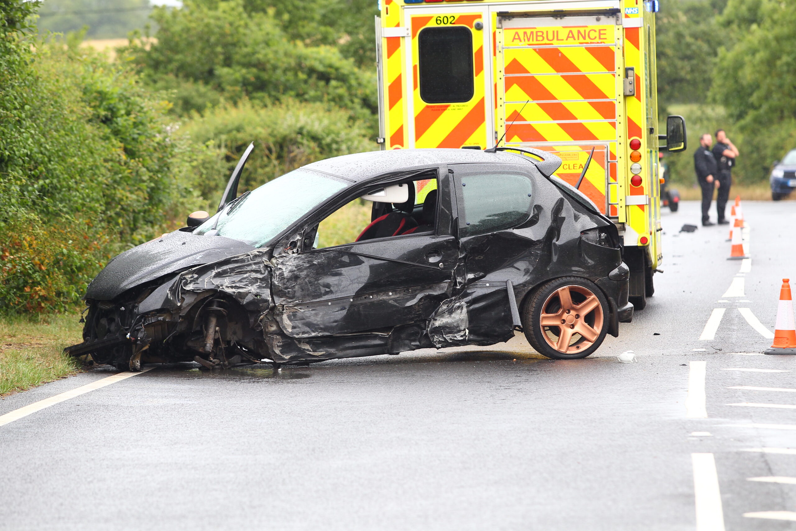 MINOR INJURIES AFTER CAR OVERTURNS IN 3 VEHICLE CRASH