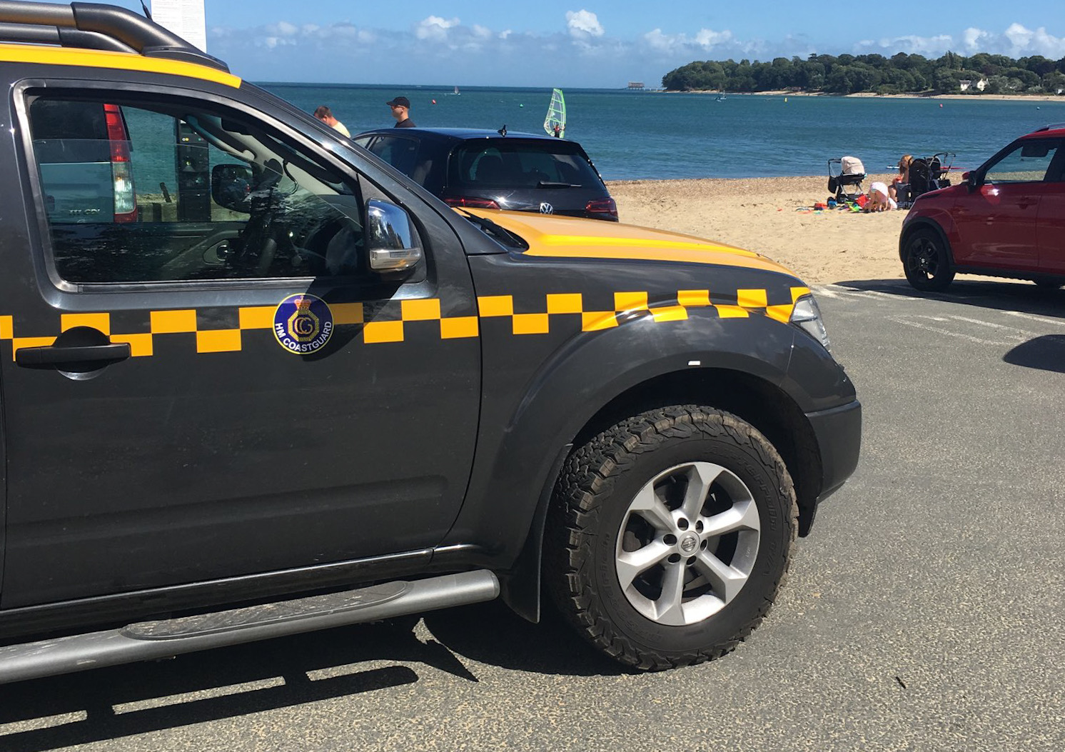 EXHAUSTED PADDLE BOARDERS RESCUED BY PASSING BOAT