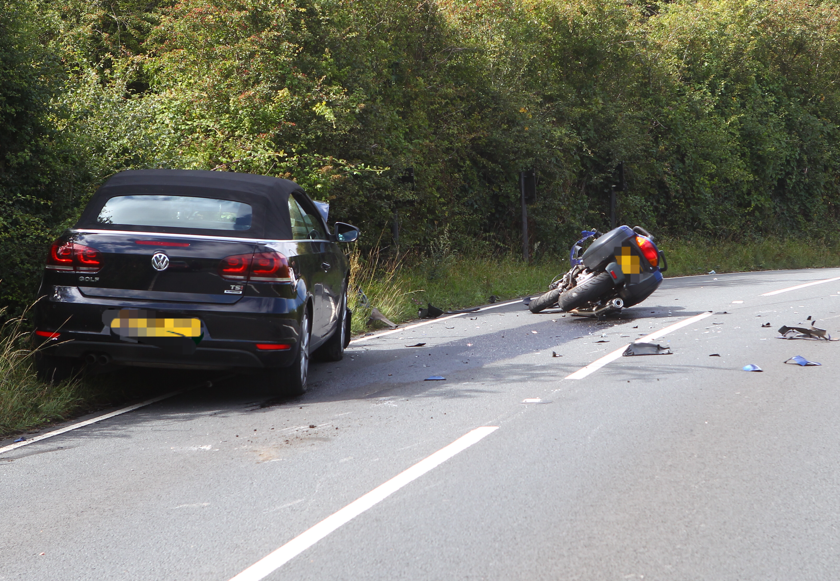 MOTORCYCLE CRASH BLOCKS ROAD TO THE DOWNS