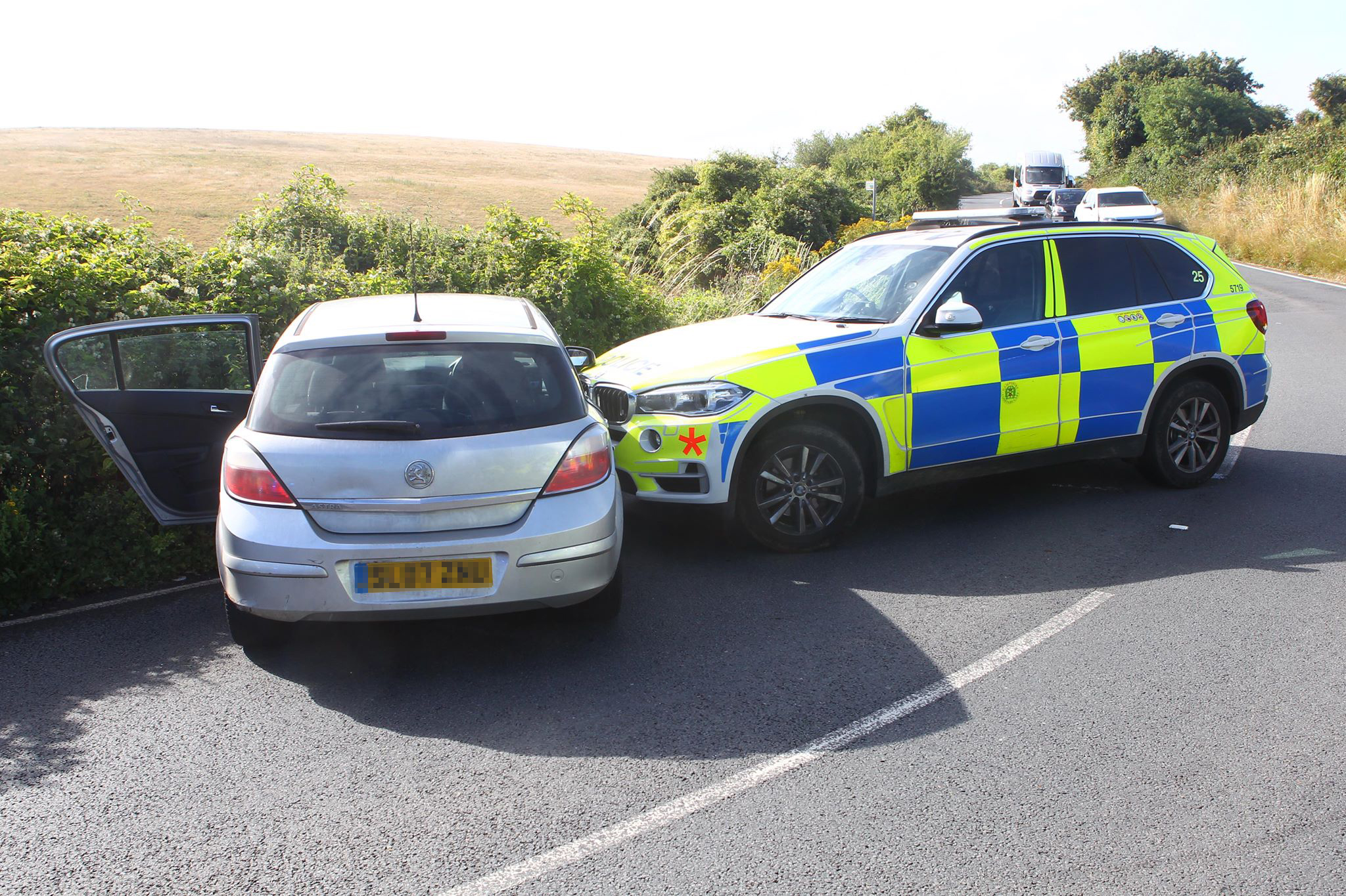 POLICE HELICOPTER IN SEARCH FOR FLEEING OCCUPANTS AFTER CAR CHASE