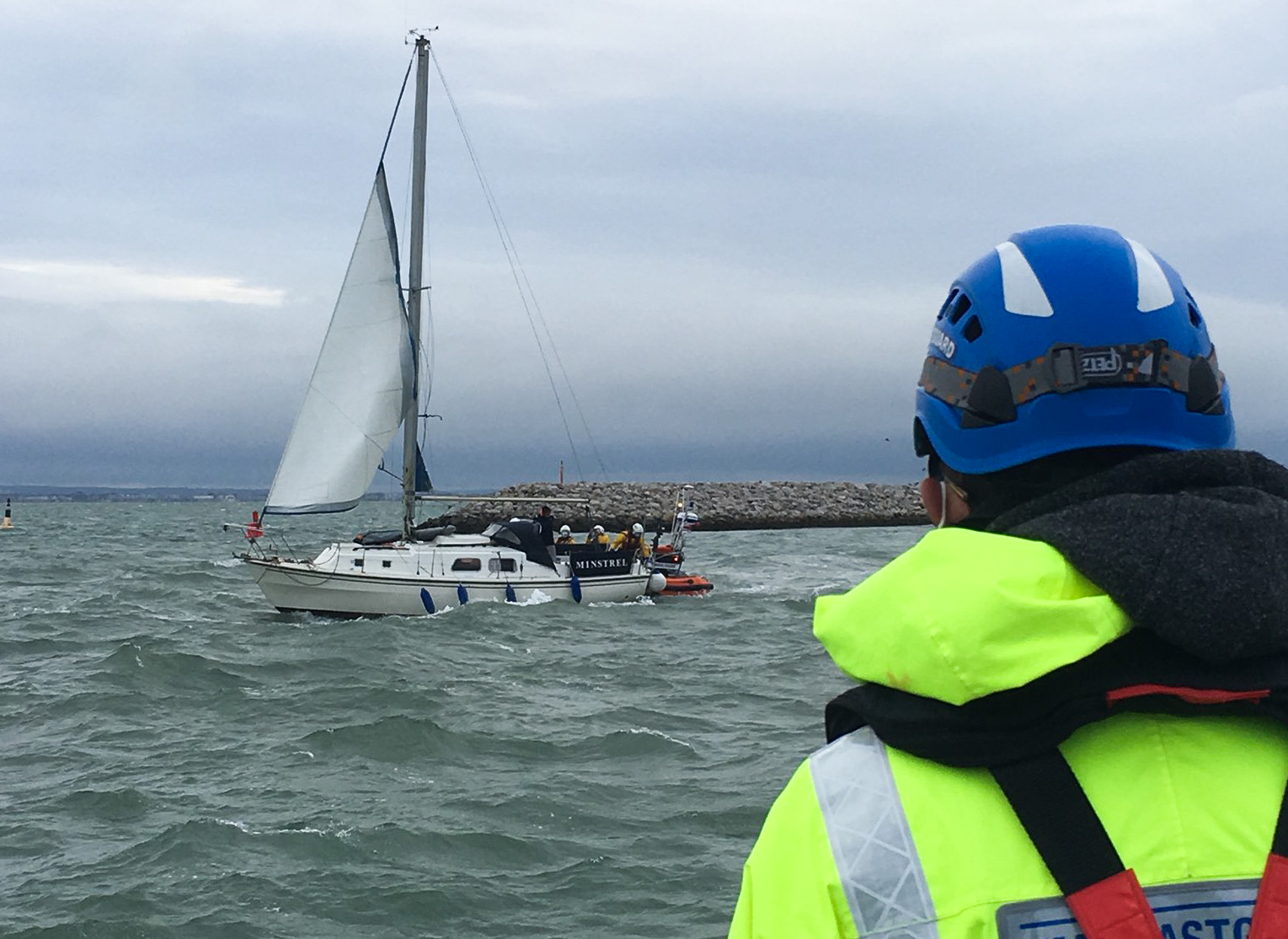 YACHT WASHES ASHORE ON THE ROCKS NEAR OSBORNE BAY