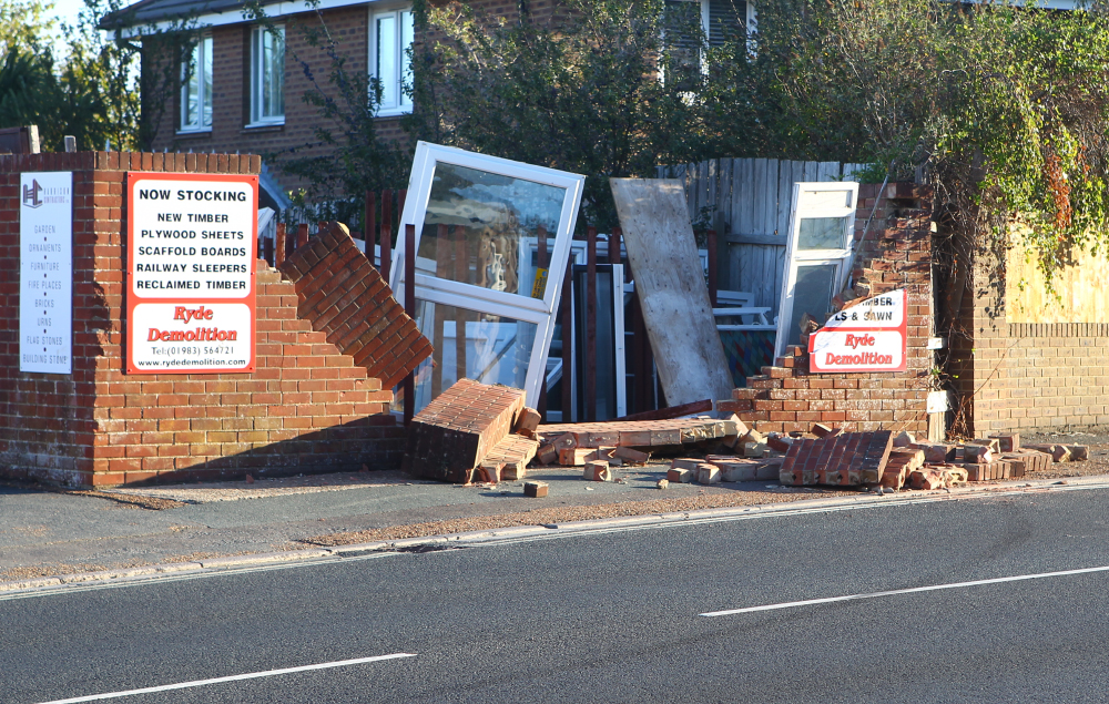 POLICE HUNTING FOR DRIVER AFTER WALL DESTROYED IN EARLY HOURS CRASH