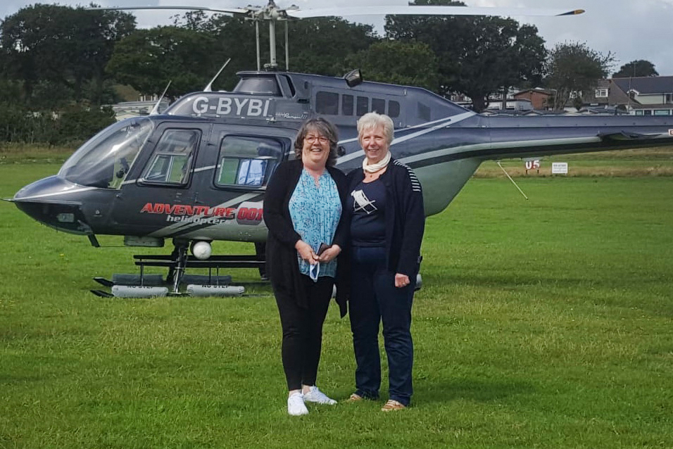 RETIRED GIRLGUIDING IW MEMBERS TAKE GIFTED HELICOPTER FLIGHT