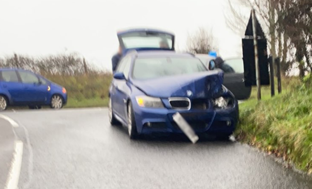 OCCUPANTS OF BMW SUSTAIN MINOR INJURIES IN KNIGHTON CRASH
