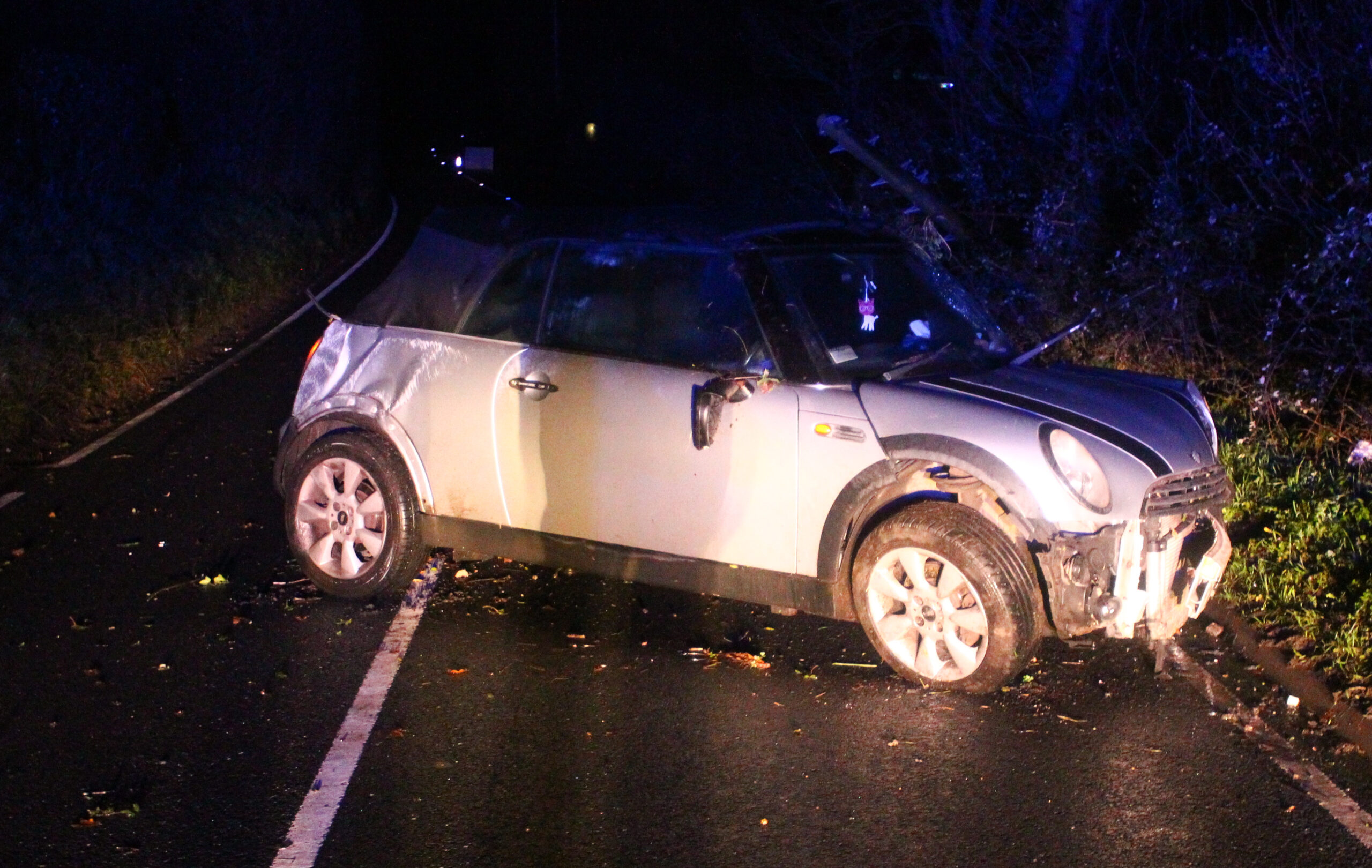 SUSPECTED DRINK DRIVER IN MINI COLLIDES WITH TELEGRAPH POLE