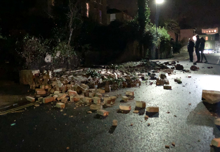 POLICE CALLED AS COLLAPSED WALL BLOCKS ROAD IN RYDE