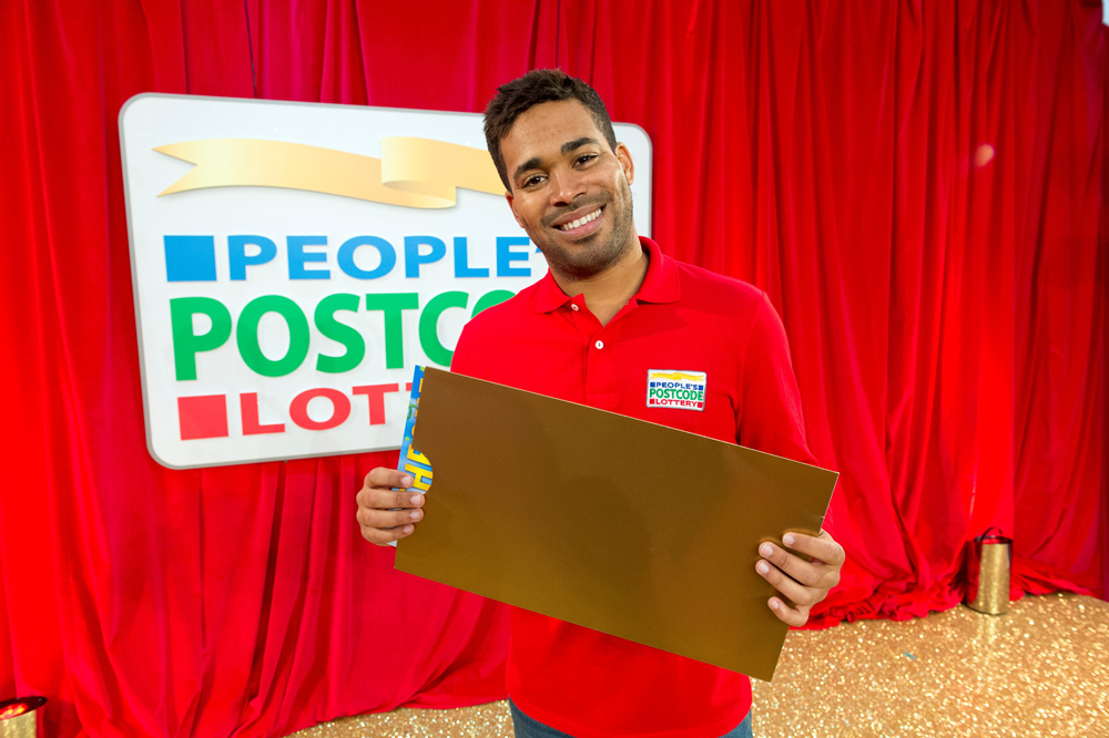 5 PEOPLE IN SANDOWN CELEBRATE AFTER WINNING POSTCODE LOTTERY