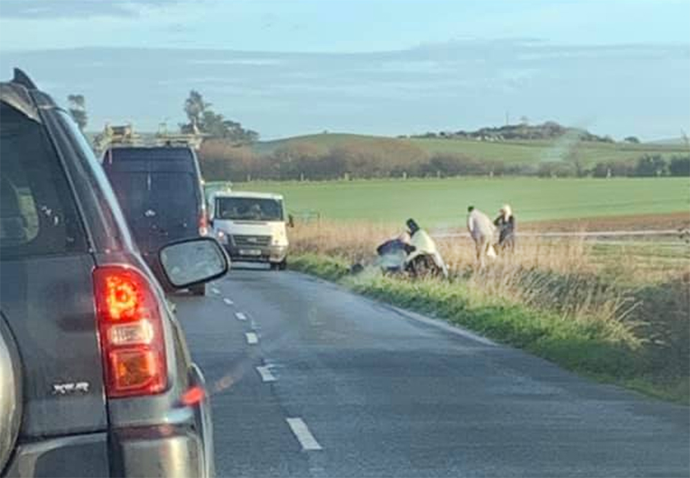 CARS LEAVE THE ROAD IN ICY CONDITIONS