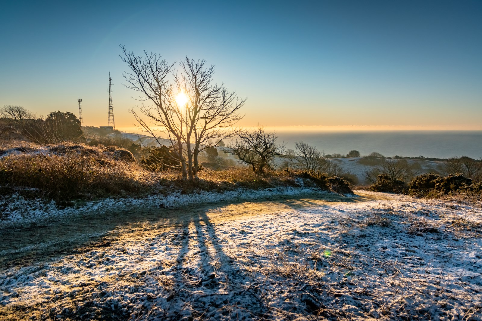 LOCAL PHOTOGRAPHER CAPTURES LIGHT DUSTING OVER ST BONIFACE DOWNS