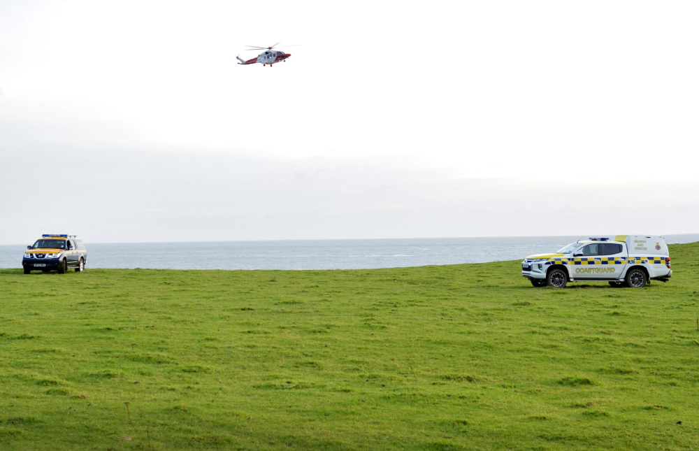 COASTGUARD HELICOPTER HELPS EVACUATE CASUALTY FROM REMOTE COASTLINE