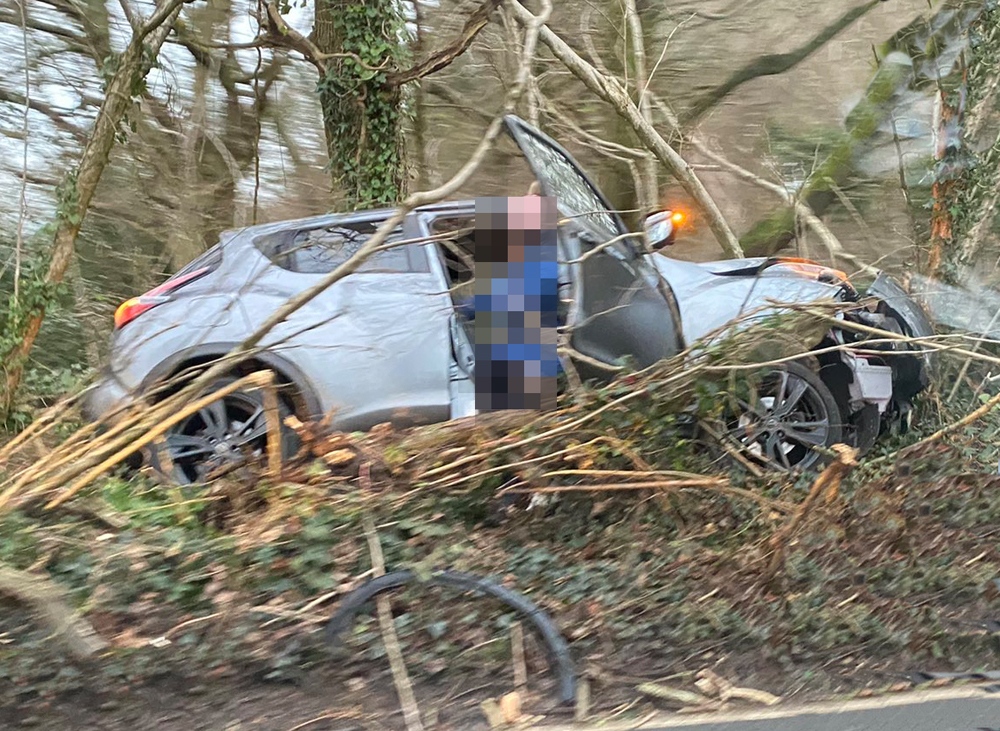 CAR CRASHES INTO WOODS ON LONG LANE NEAR NEWPORT