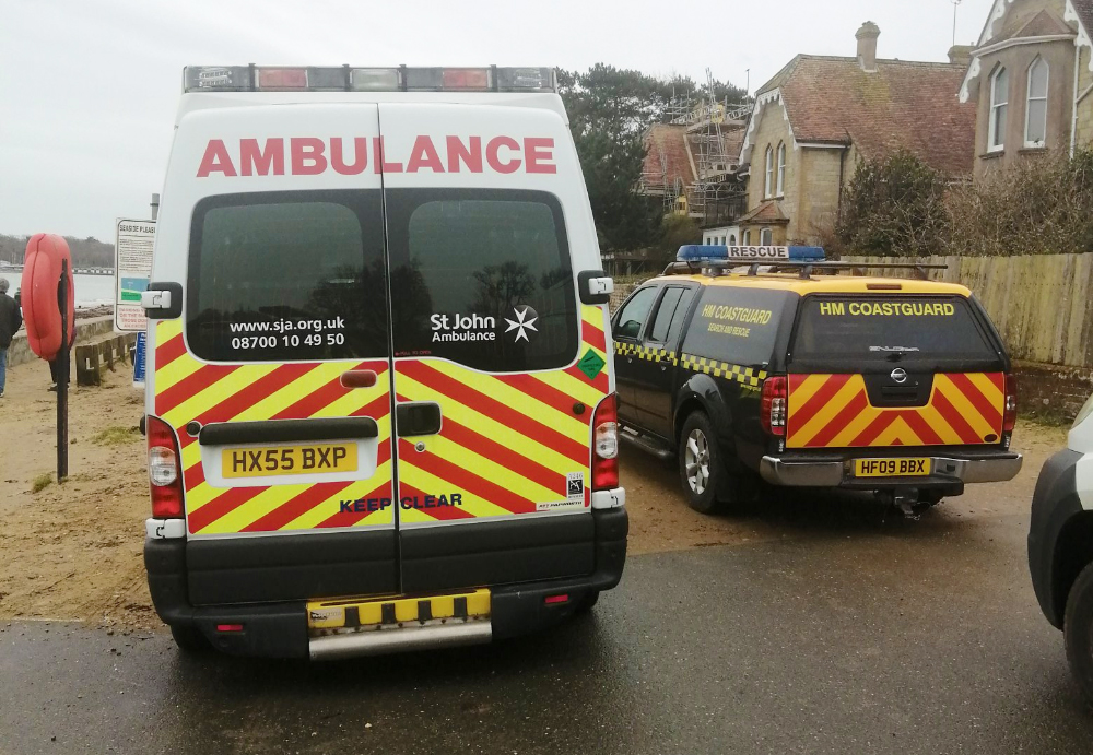 INJURED WOMAN STRETCHERED TO AMBULANCE BY COASTGUARD AT ST HELENS