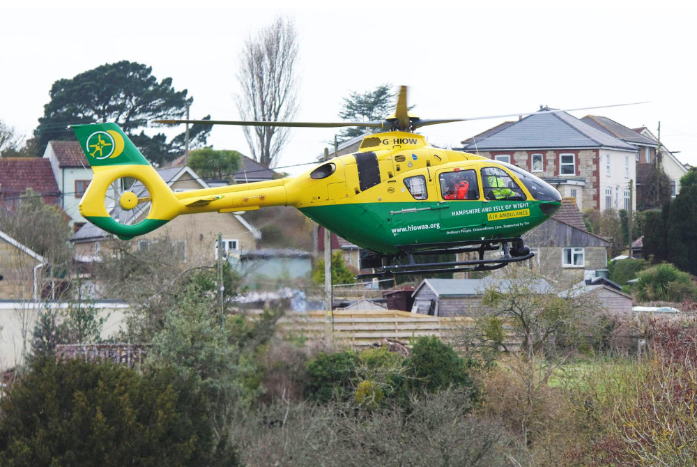 HAMPSHIRE & ISLE OF WIGHT AIR AMBULANCE LANDS FOR MEDICAL EMERGENCY IN NEWBRIDGE