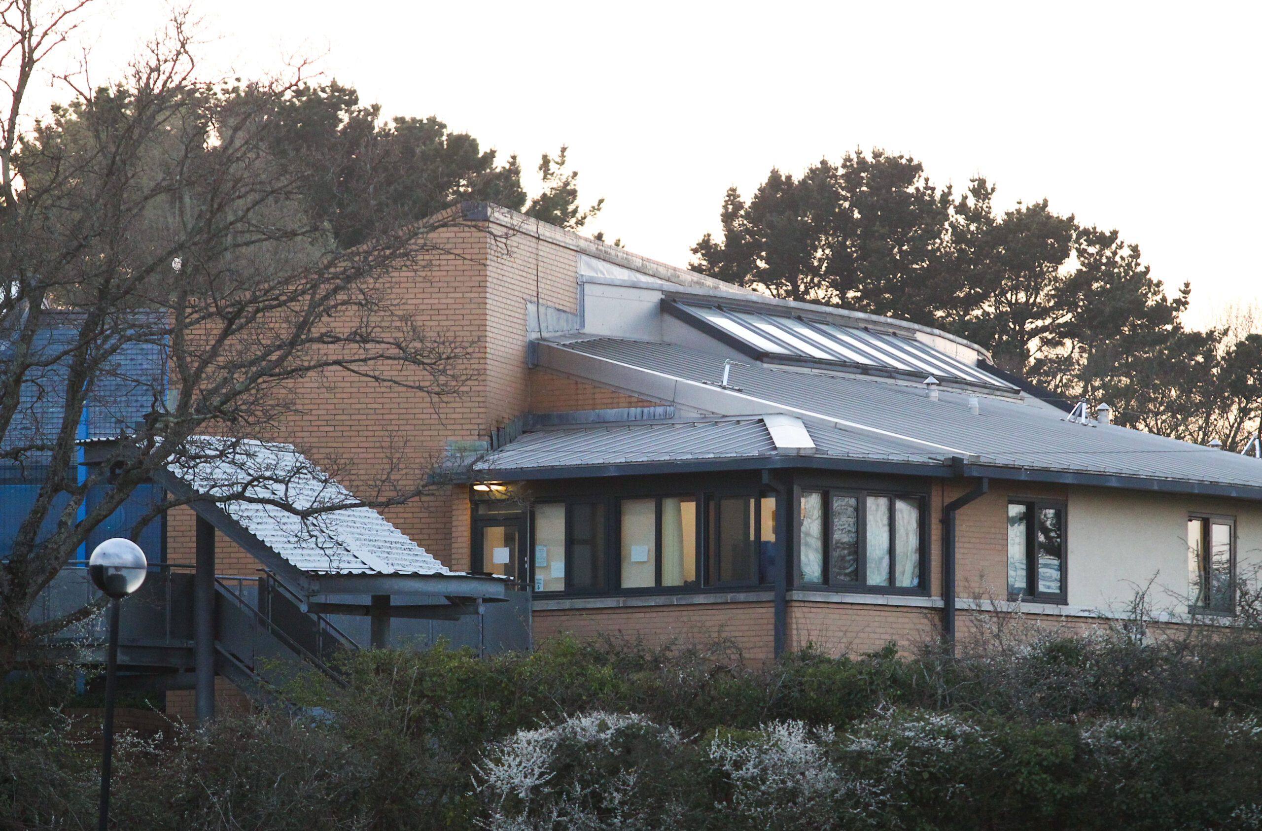 2 POLICE CARS DAMAGED BY TILES IN SEVENACRES ROOF TOP STAND OFF