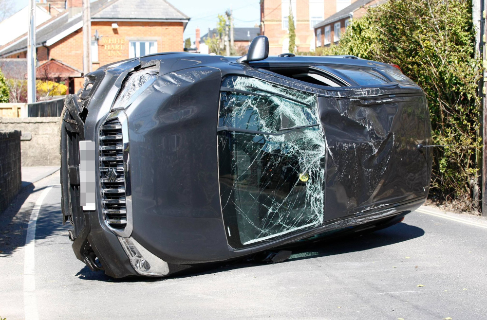 CAR ROLLS OVER AND COMES TO REST ON ITS SIDE IN HAVENSTREET
