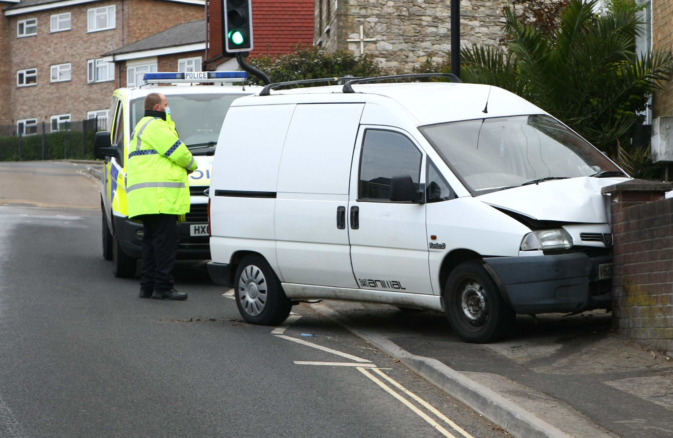 POLICE CALLED AFTER VAN PLOUGHS INTO GARDEN WALL