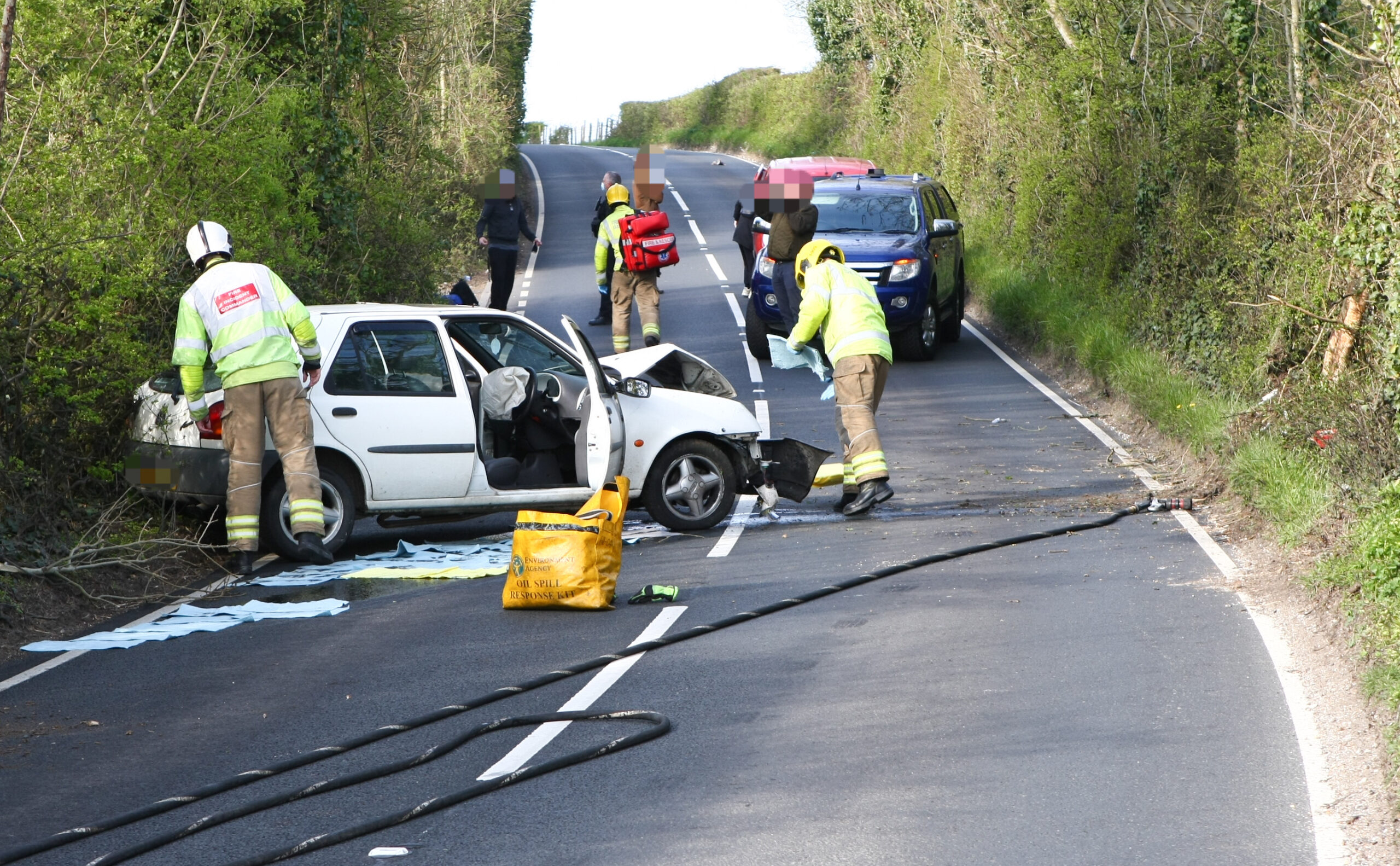 CRASH AND OIL LEAK CLOSES ASHEY ROAD